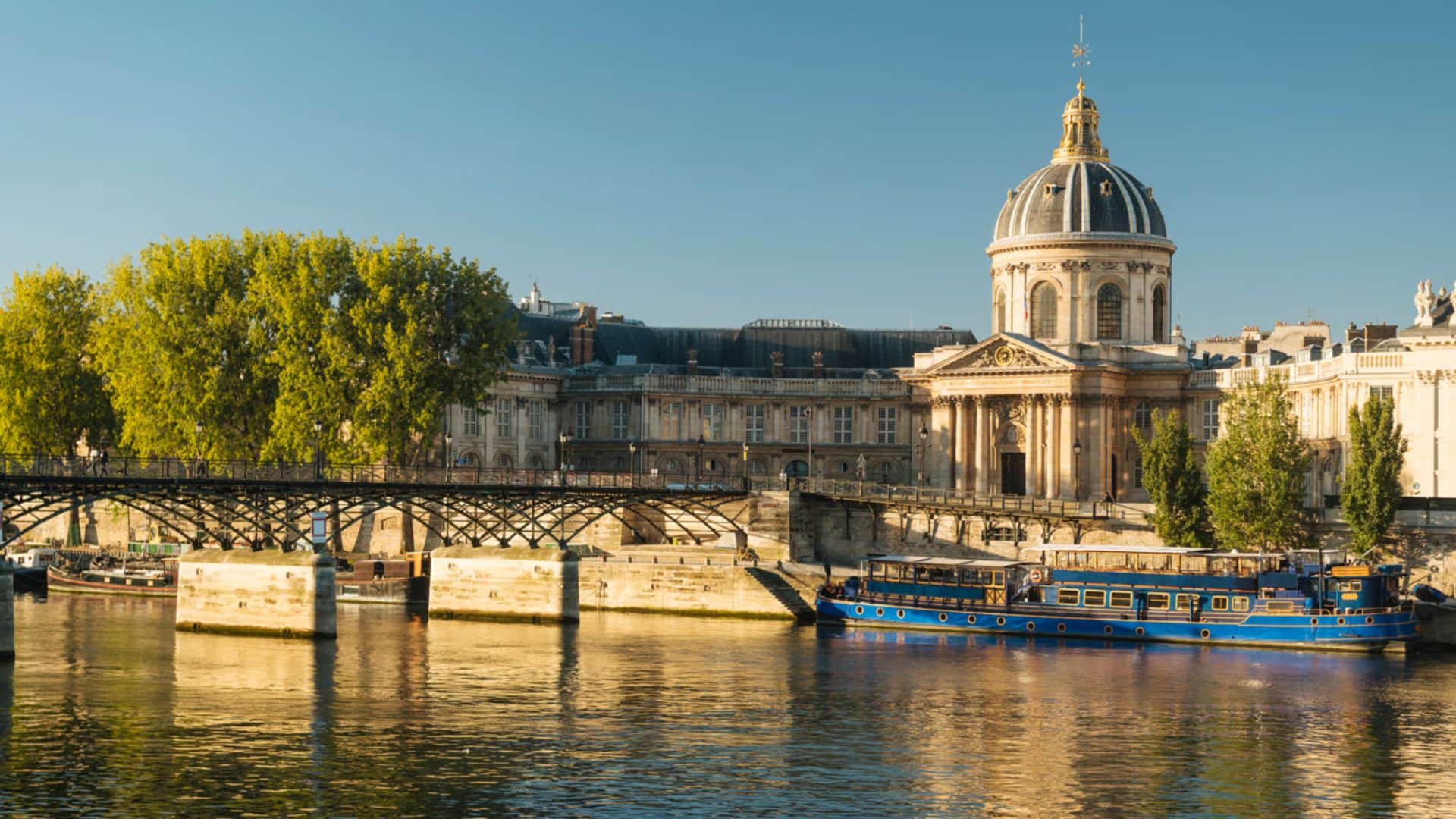 View of the Institut de France and the Pont des Arts over the Seine in central Paris.